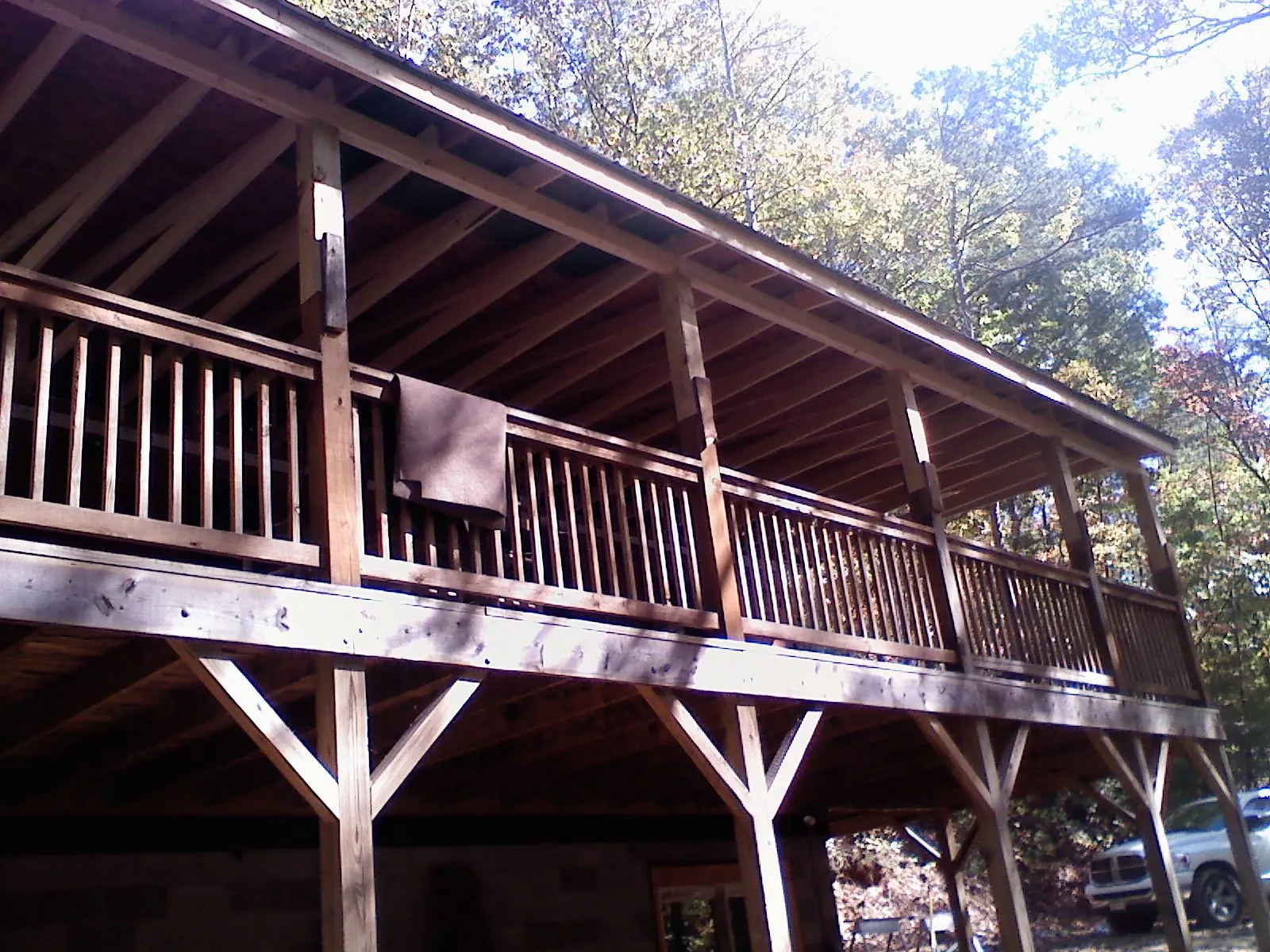 Timber framing under a new elevated porch and deck — Roof Leak Repair in Vail by Roofing Brothers